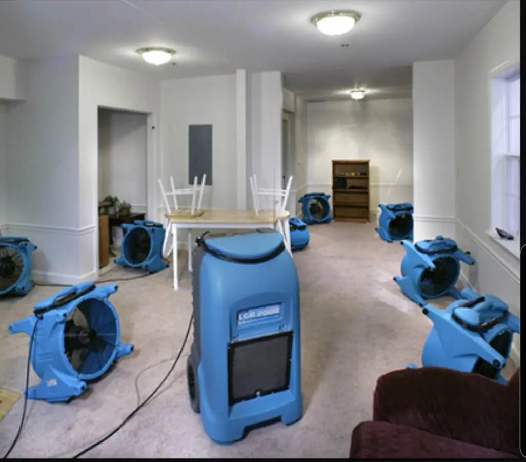 Air movers and dehumidifier setup for Water Damage Restoration in Clarkston